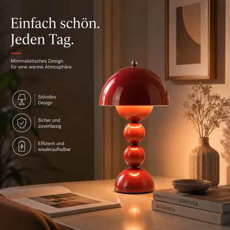 Rote kabellose LED-Tischlampe im nordischen Retro-Design als stimmungsvolle Beleuchtung auf einem Beistelltisch.
